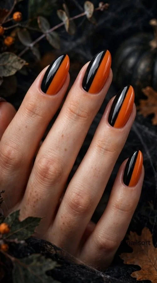Black and Orange Almond Nails